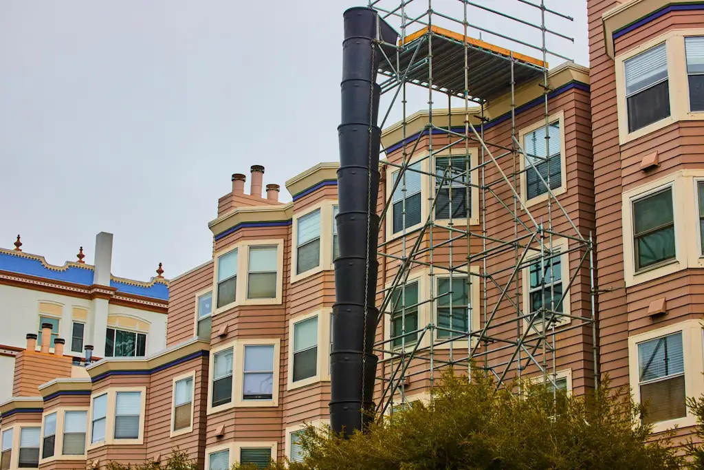 Residential scaffolding setup on multi-story home in Berkeley for exterior repairs and maintenance work