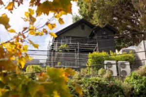 Residential home in Berkeley with scaffolding setup for exterior renovation and maintenance project
