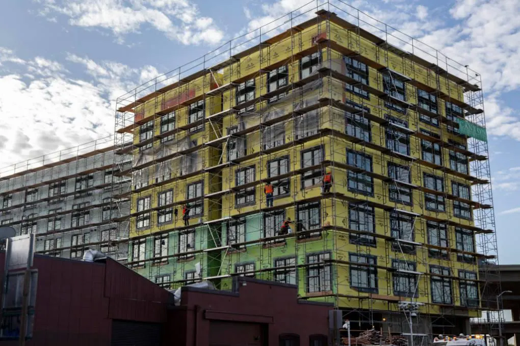 Large commercial scaffolding system installed on building construction site for safe worker access in Berkeley